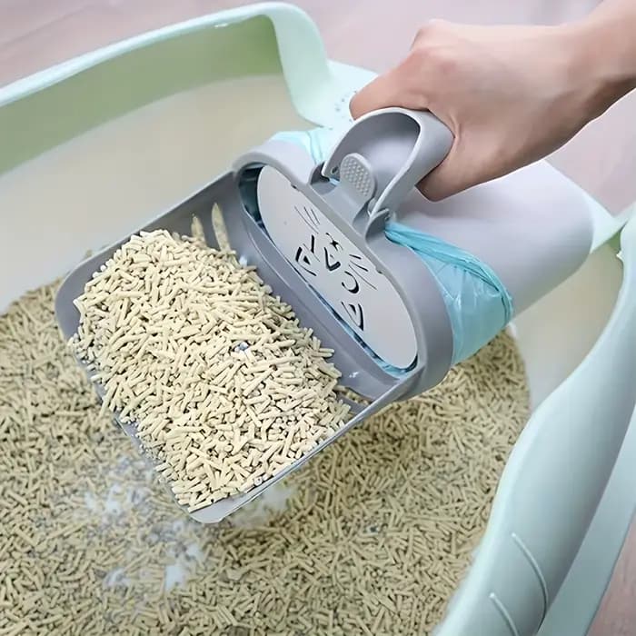 Pelle à litière pour chat avec distributeur de sacs poubelles intégré