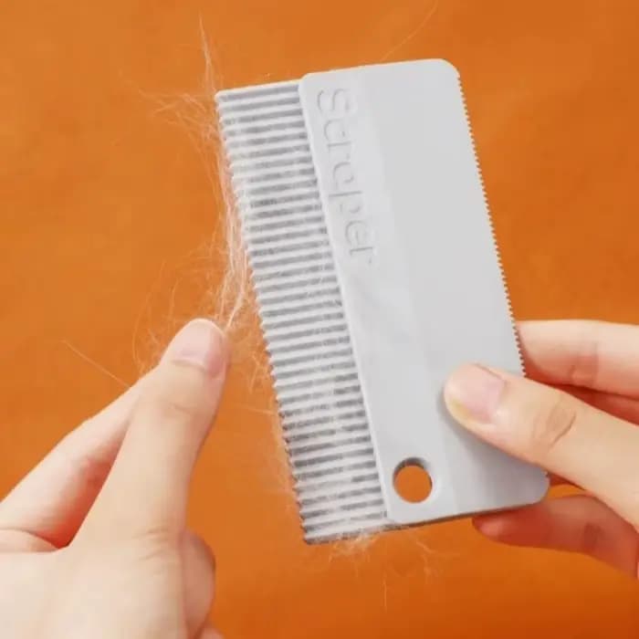 Brosse de nettoyage pour poils d'animaux