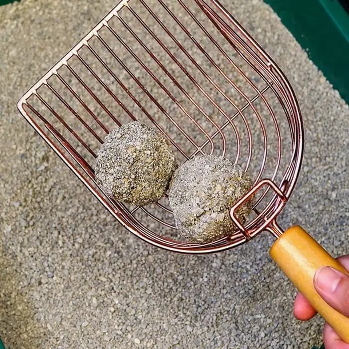 Pelle à litière pour chat autonettoyante