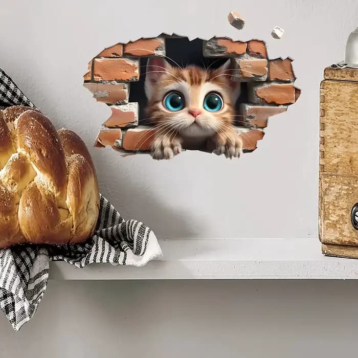 Un autocollant mural avec un motif de chat mignon qui ajoute une touche animée à votre décoration intérieure