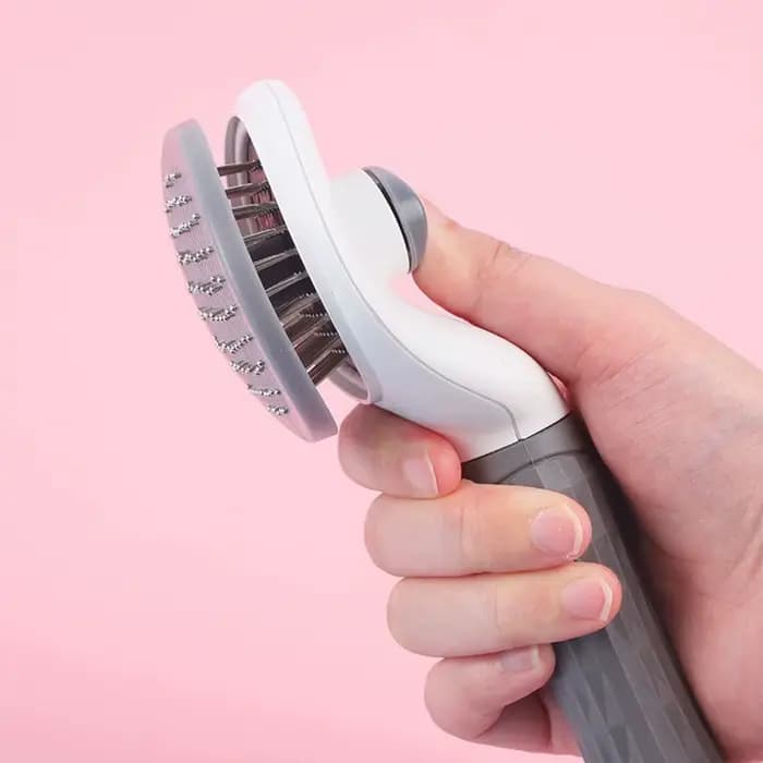 Brosse autonettoyante pour chiens et chats
