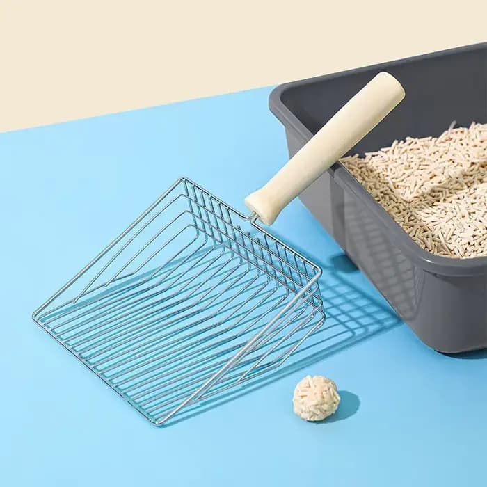Pelle à litière pour chat avec manche en bois
