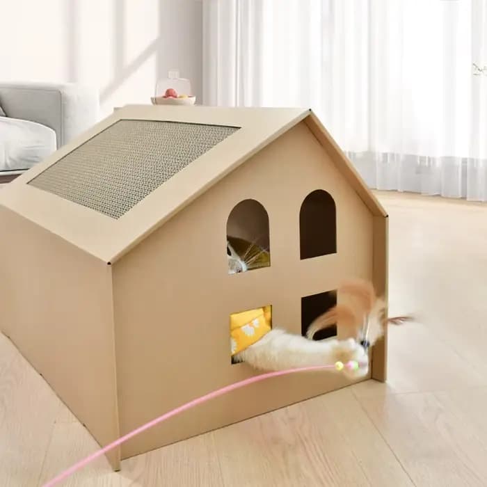 Maison de chat en papier avec tampons à gratter pour l'intérieur