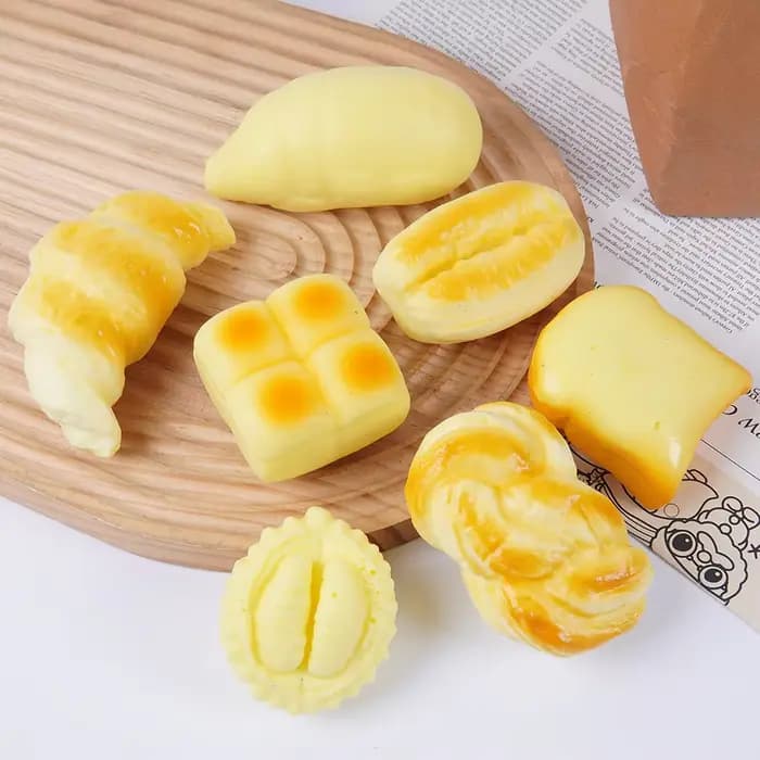 Jouet à presser en forme de croissant moelleux