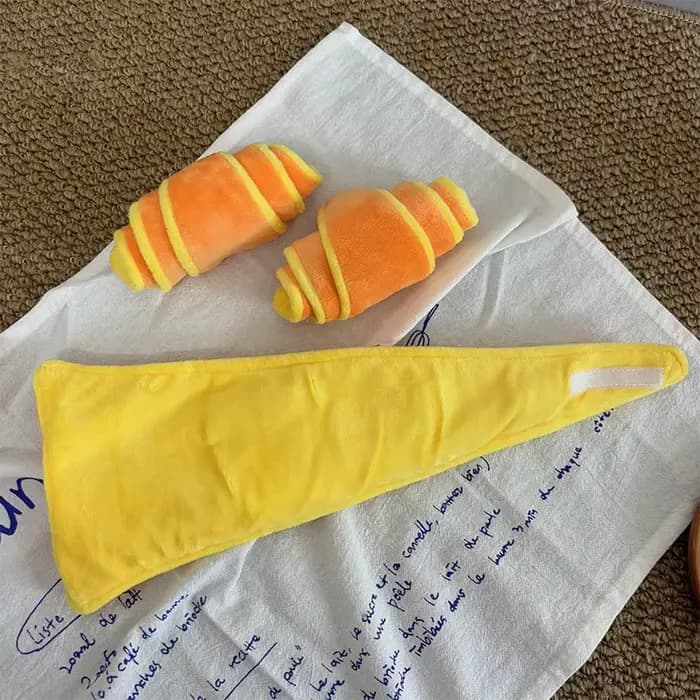 Jouet pour chien en forme de croissant souple