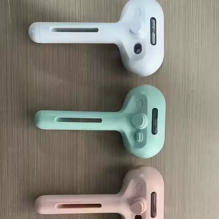 Brosse à vapeur pour chat