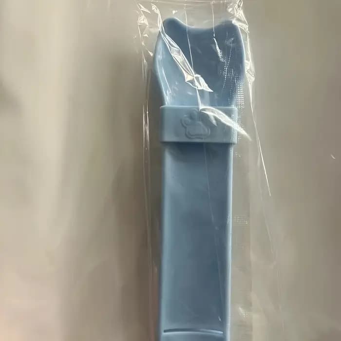 Cuillère à presser pour bande de chat